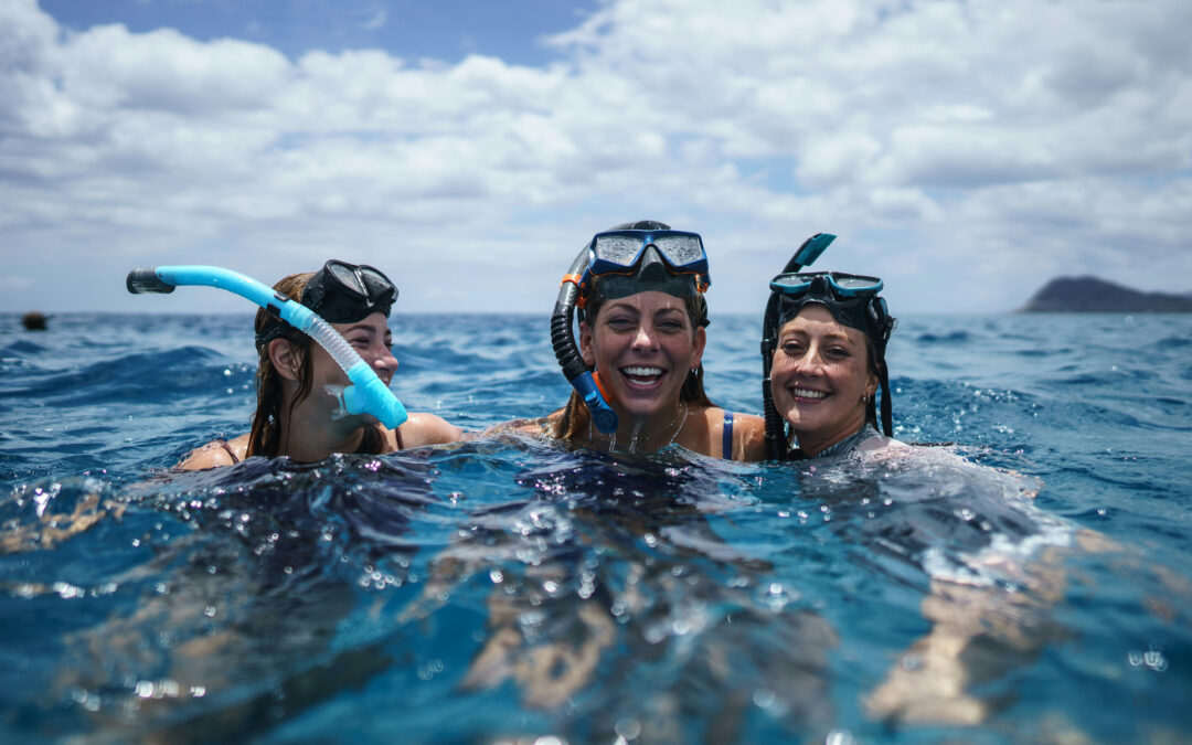 Three women snorkeling in Puerto Escondido