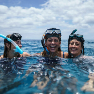 Three women in the snorkeling tours in Puerto Escondido